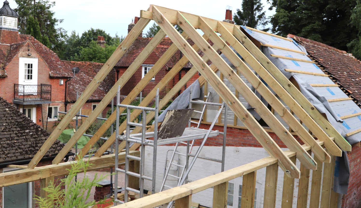 JULY 2022 - The original roofing line was extended unsympathetically (in archaeological terms) over the footprint of the tin (potting) shed, and past that footprint east by a considerable amount. Way past the block that identified the origins of the stable courtyard; altering the character of the equine origins of the complex. Property developers frequently ignore 'character' in the quest for greater floor area to assist uplift in property value when selling on. A property developer need not be a typically commercial enterprise by a limited company or partnership, but a private owner/occupier, taking advantage of capital gains tax laws over a number or years, as they move from one conversion to another, profiting as they go. Alternatively, properties may be purchased and left in Trust in a Will to offspring to avoid Death Duties. Not so in this case, according to the Land Registry. But time will tell. This development took place without planning consent - under permitted development rights, attracting a retrospective application some months after construction work was near completed - not necessarily indicative of the intention to sell. Permitted development rights as per the 2015 Order, allows householders to extend property by a good percentage without the need to apply for planning permission. New laws in 2024 make development outside of such 'Rights' lawful after 10 years without challenge by an Enforcement Notice. Before January 2024 immunity from enforcement was acquired after 4 years.